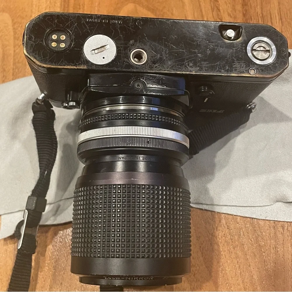 Vintage Nikon FM2 black camera with lens